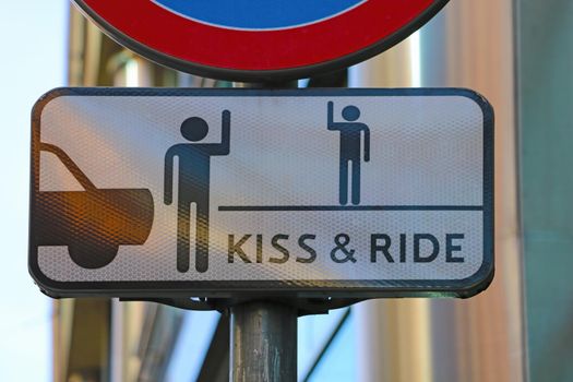 Wroclaw, Poland, May 5, 2021: funny road sign in the old part of the city. Kiss and let's go. Out of focus, blurred.