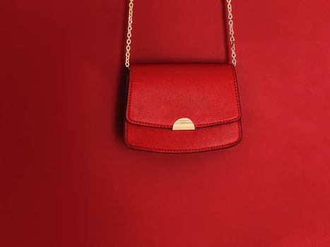 Red fashionable leather purse with gold details as designer bag and stylish accessory, female fashion and luxury style handbag collection concept