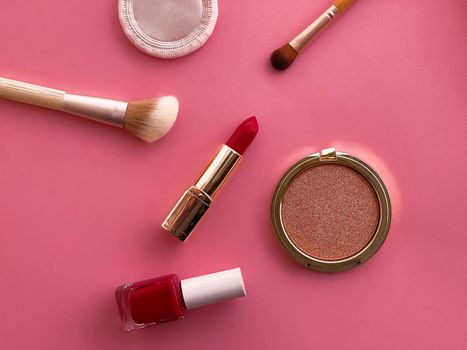 Beauty, make-up and cosmetics flatlay design with copyspace, cosmetic products and makeup tools on pink background, girly and feminine style concept