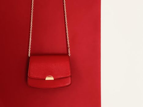 Red fashionable leather purse with gold details as designer bag and stylish accessory, female fashion and luxury style handbag collection concept