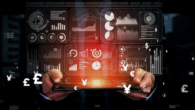 Big Data Technology for Business Finance Analytic conceptual. Modern graphic interface shows massive information of business sale report, profit chart and stock market analysis on screen monitor.