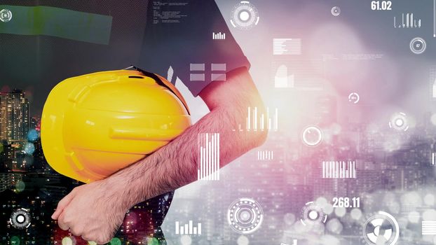 Future building construction and inventive engineering project concept with HUD hologram graphic design. Building engineer, architect people or construction worker works with modern civil technology.