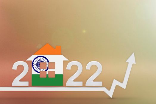 The cost of real estate in India in 2022. Rising cost of construction, insurance, rent in India. 3d House model painted in flag colors, up arrow on yellow background.