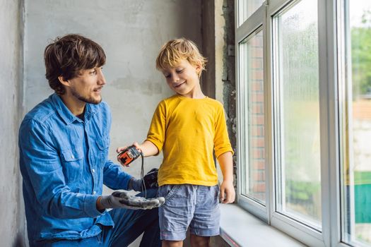 Father and son repair windows together. Repair the house yourself.