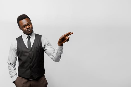 Black african business man points to right side empty for adver text. You can change your life. Successful people lifestyle advert.