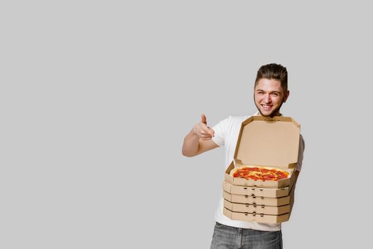 Online 4 pizza boxes safety delivery servise from restaurant. promotion pizza with cheese boards.