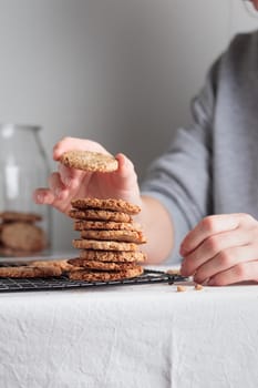 Stack of homemade oat cookies on a table