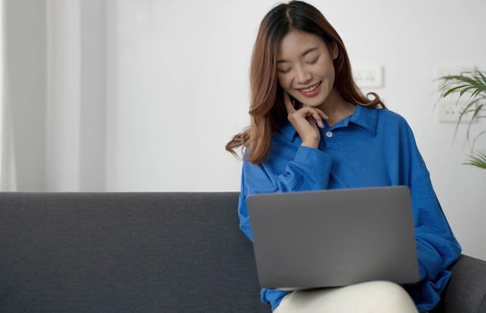 Recruitment Concept. Girl Browsing Work Opportunities Online, Using Job Search App or Website on Laptop, Copy Space