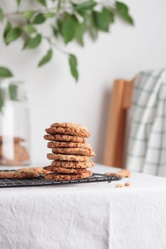 Stack of homemade oat cookies on a table