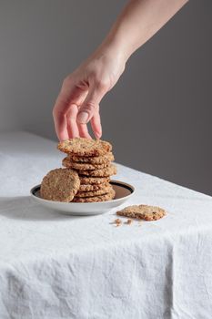Stack of homemade oat cookies on a table