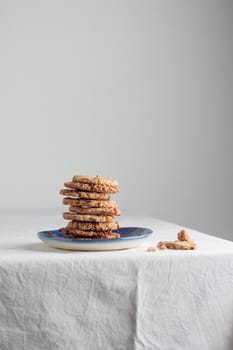 Stack of homemade oat cookies on a table