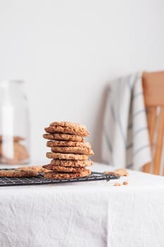 Stack of homemade oat cookies on a table