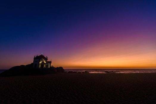 Tourism trip to Portugal, Porto, famous for the Capela do Senhora Pedra. Amazing cliff rocks on the Atlantic ocean west coast of Portugal in Alentejo