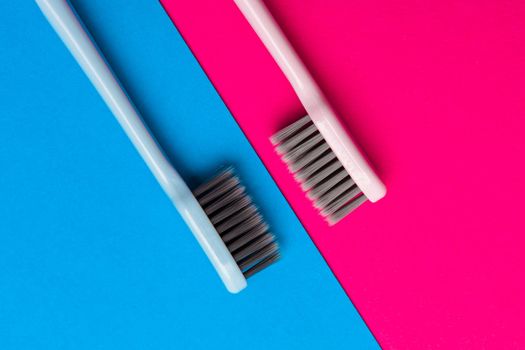Flat lay composition with manual toothbrushes on color background, close up. creative photo.