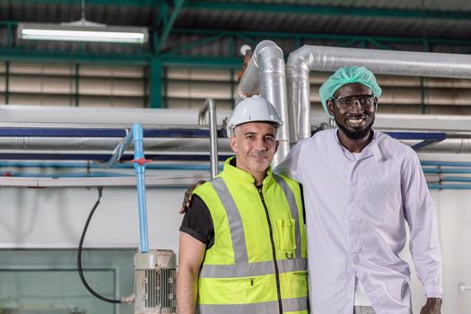 portrait African black and American mix race worker as factory labor happy working together standing smile