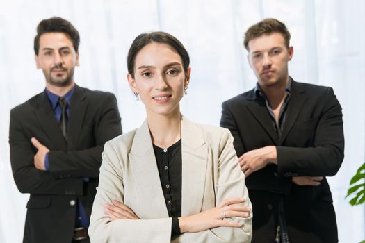 Smart businesswomen manager standing confident team group arm crossed with male teamwork in modern office happy smiling.