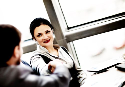 Business people shaking hands, finishing up a meeting