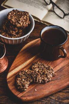 Banana oatmeal cookies with chocolate spread and mug of coffee