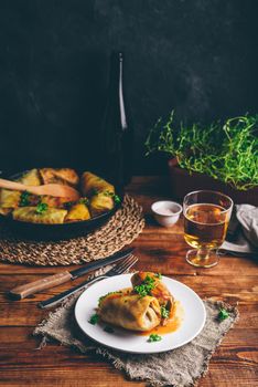 Cabbage Rolls Stuffed with Minced Beef on White Plate Garnished with Chopped Parsley