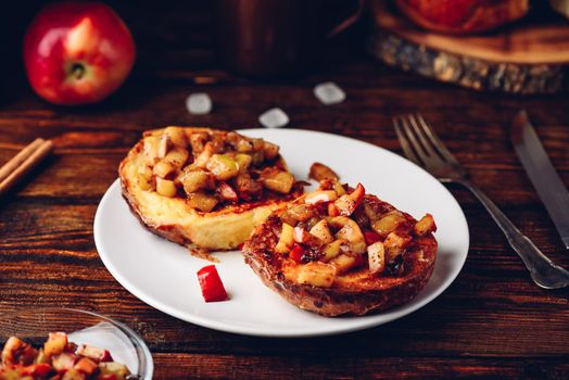 French toasts with chopped apple caramelized with cinnamon