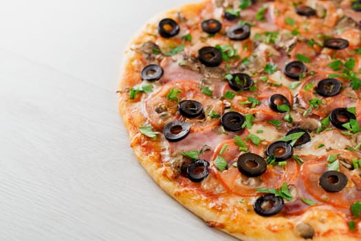 Big pizza isolated on white background. Tasty fast food at quarantine coronavirus covid-19 period. Food delivery for people who stay at home