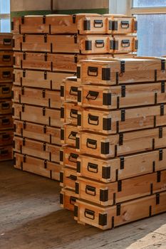 Stacks of military wooden unpainted crates