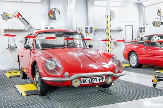 DIEPPE, FRANCE - JUNE 30, 2018: Alpine car red modele 110 Berlinette V85 at the factory exposition Vintage and classic Cars.