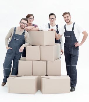 Men holding pile of carton boxes isolated on white background