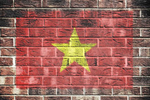 A Vietnam flag on a brick wall background