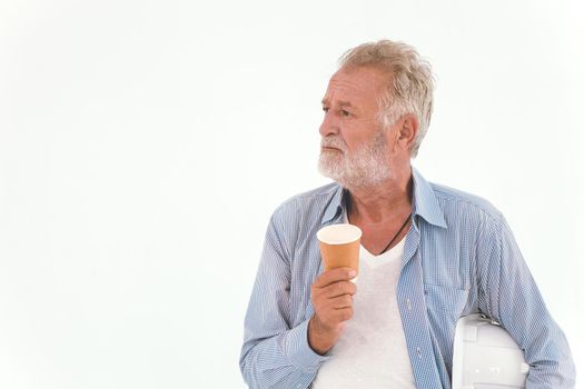 old man American Caucasian worker hand holding paper coffee cup wearing casual relax clothes looking away isolated on white background. Engineer Thinking or vision dreaming elder