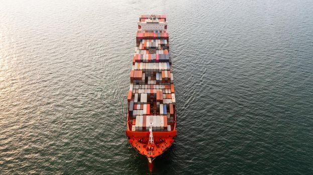 Container ship leaving the industrial seaport, Global business Import export, Company business logistic and transportation international by container cargo freight ship in the open sea.