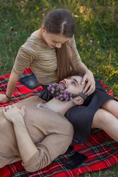 man with flowers in his beard