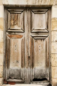 Old carved wooden door in Villajoyosa town, Alicante, Spain