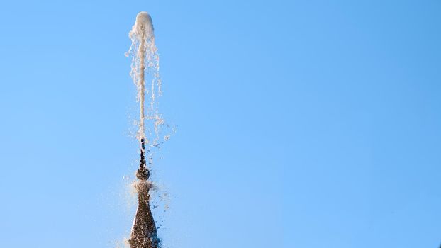 an ornamental structure in a pool or lake from which one or more jets of water are pumped into the air.