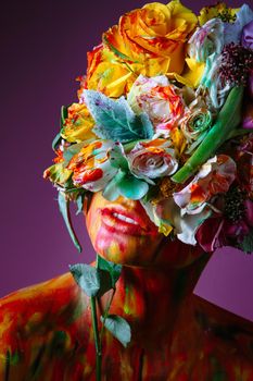 A girl with fresh flowers on her head. Flower Man