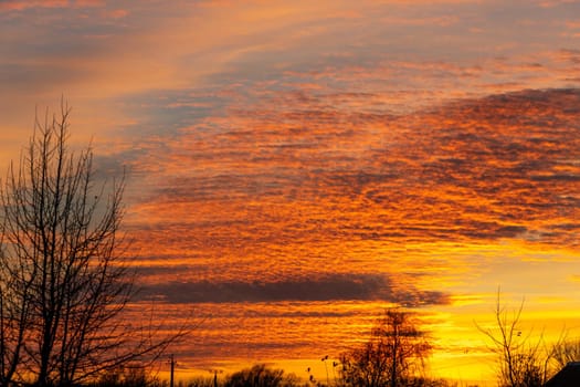 Beautiful sky landscape with yellow clouds at a sunset