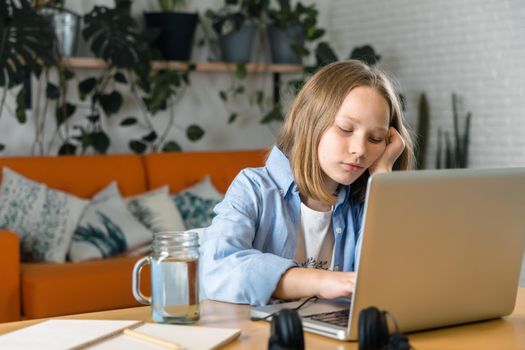 teenager is studying at home on carrantine. High quality photo