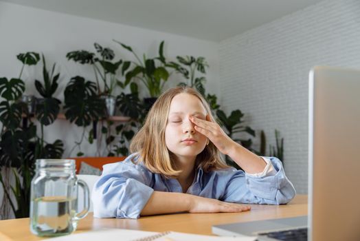 teenager is studying at home on carrantine. High quality photo