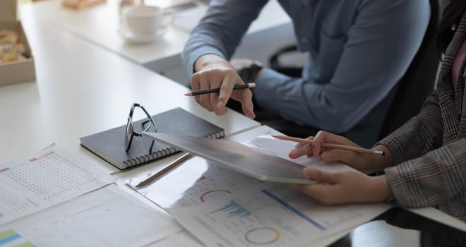 Team of business people working together in the meeting room office, teamwork background charts and graphs banner, double exposure successful teamwork,business planning concept..