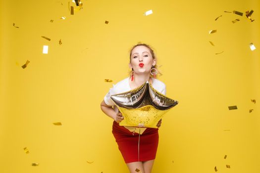 Fashionable womancelebrating a party event having fun and smiling with balloons