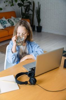 teenager is studying at home on carrantine. High quality photo