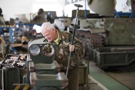Military factory.Repair of tanks.Maintenance of military equipment. Production of weapons.Warehouse of military equipment