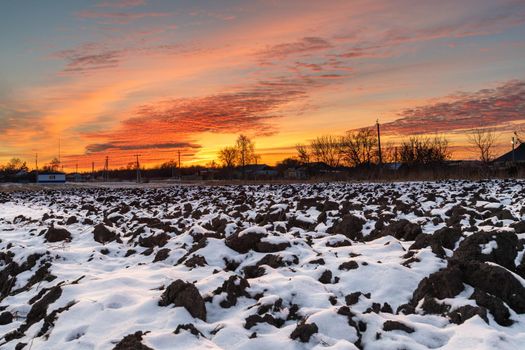 View of beautiful sunset from a snowy field