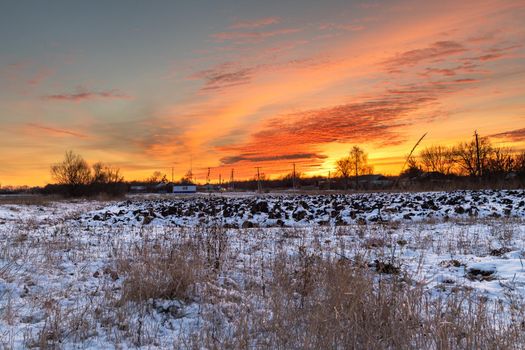 View of beautiful sunset from a snowy field