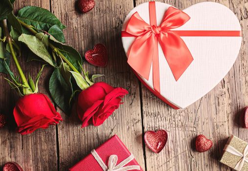 Gift box on a wooden background. Valentine's Day gift.selectiv focus.holiday