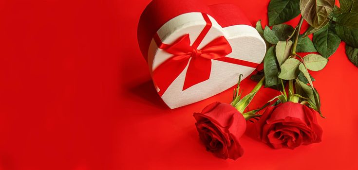 Gift box on a wooden background. Valentine's Day gift.selectiv focus.holiday