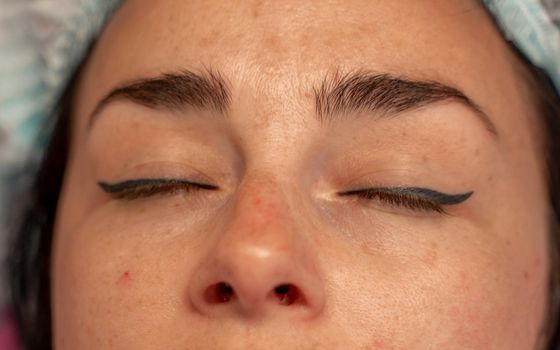 Eyelash extension procedure. Woman eye with long eyelashes. lashes, close up, macro, selective focus