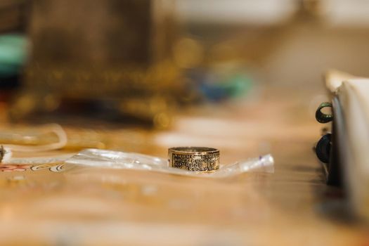 Sacred ring on the table. Orthodox faith. Equipment for praying. Pray for people life. Pray to god