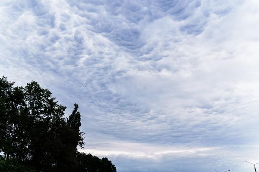 Terrible sky storm with beautiful blue clouds. Nature of native land. Windy weather