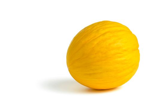 Melon on a white background. Yellow melon on a white isolate. For insertion into a project, design or advertisement